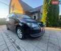Черный Фольксваген Туран, объемом двигателя 1.4 л и пробегом 222 тыс. км за 7499 $, фото 1 на Automoto.ua
