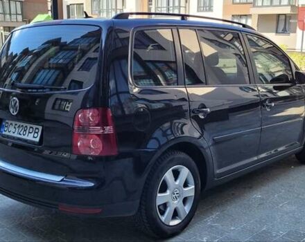 Черный Фольксваген Туран, объемом двигателя 1.97 л и пробегом 248 тыс. км за 8300 $, фото 5 на Automoto.ua