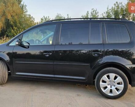 Черный Фольксваген Туран, объемом двигателя 1.4 л и пробегом 194 тыс. км за 7600 $, фото 6 на Automoto.ua