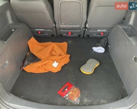 Черный Фольксваген Туран, объемом двигателя 1.4 л и пробегом 190 тыс. км за 5313 $, фото 2 на Automoto.ua