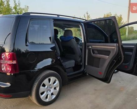 Черный Фольксваген Туран, объемом двигателя 1.4 л и пробегом 194 тыс. км за 7600 $, фото 11 на Automoto.ua