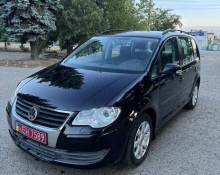 Чорний Фольксваген Туран, об'ємом двигуна 1.4 л та пробігом 172 тис. км за 6950 $, фото 1 на Automoto.ua