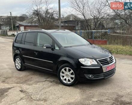Черный Фольксваген Туран, объемом двигателя 1.4 л и пробегом 194 тыс. км за 6555 $, фото 3 на Automoto.ua