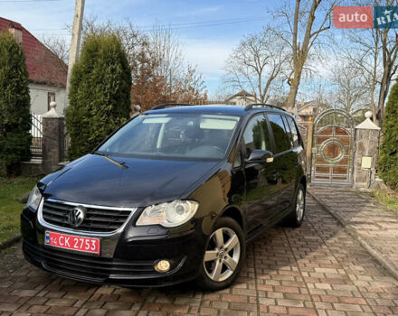 Чорний Фольксваген Туран, об'ємом двигуна 1.4 л та пробігом 148 тис. км за 5999 $, фото 4 на Automoto.ua