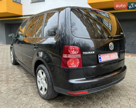 Черный Фольксваген Туран, объемом двигателя 1.6 л и пробегом 180 тыс. км за 8200 $, фото 14 на Automoto.ua