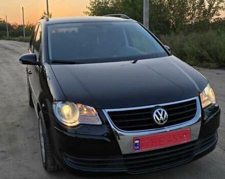 Черный Фольксваген Туран, объемом двигателя 1.4 л и пробегом 194 тыс. км за 7600 $, фото 3 на Automoto.ua