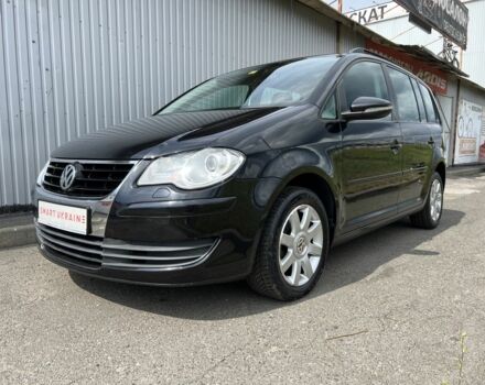 Черный Фольксваген Туран, объемом двигателя 1.4 л и пробегом 203 тыс. км за 6550 $, фото 4 на Automoto.ua