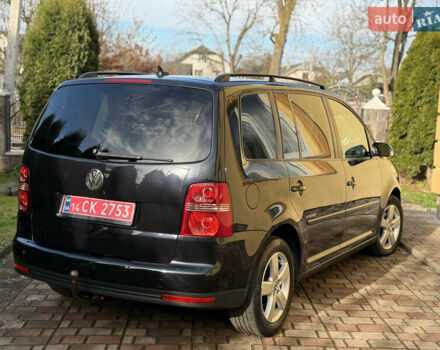 Чорний Фольксваген Туран, об'ємом двигуна 1.4 л та пробігом 148 тис. км за 5999 $, фото 28 на Automoto.ua