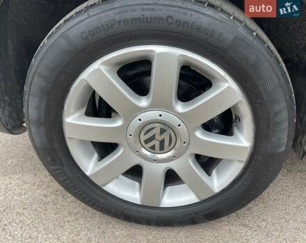 Черный Фольксваген Туран, объемом двигателя 1.4 л и пробегом 194 тыс. км за 6555 $, фото 6 на Automoto.ua