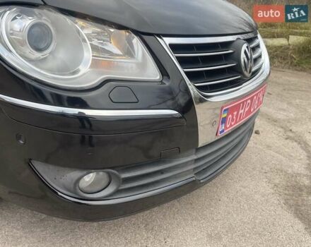 Черный Фольксваген Туран, объемом двигателя 1.4 л и пробегом 194 тыс. км за 6555 $, фото 14 на Automoto.ua