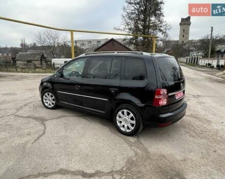 Черный Фольксваген Туран, объемом двигателя 1.4 л и пробегом 194 тыс. км за 6555 $, фото 72 на Automoto.ua