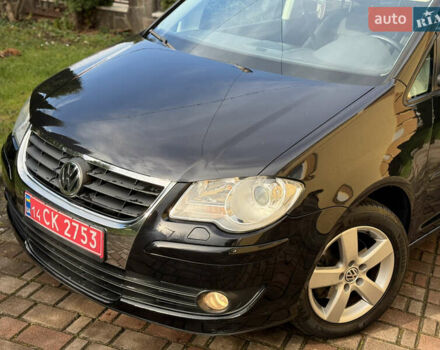 Чорний Фольксваген Туран, об'ємом двигуна 1.4 л та пробігом 148 тис. км за 5999 $, фото 66 на Automoto.ua