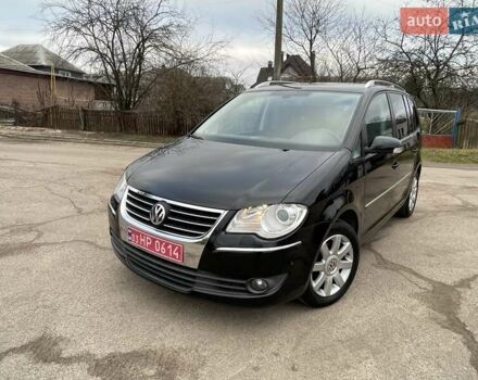 Черный Фольксваген Туран, объемом двигателя 1.4 л и пробегом 194 тыс. км за 6555 $, фото 17 на Automoto.ua