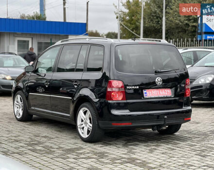 Черный Фольксваген Туран, объемом двигателя 1.4 л и пробегом 195 тыс. км за 7600 $, фото 4 на Automoto.ua