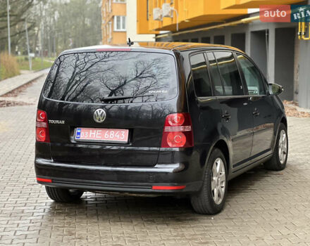 Черный Фольксваген Туран, объемом двигателя 1.6 л и пробегом 180 тыс. км за 8200 $, фото 5 на Automoto.ua