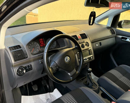 Чорний Фольксваген Туран, об'ємом двигуна 1.4 л та пробігом 148 тис. км за 5999 $, фото 35 на Automoto.ua
