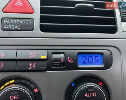 Черный Фольксваген Туран, объемом двигателя 1.4 л и пробегом 194 тыс. км за 6555 $, фото 105 на Automoto.ua