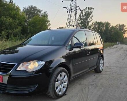 Черный Фольксваген Туран, объемом двигателя 1.4 л и пробегом 194 тыс. км за 7600 $, фото 4 на Automoto.ua