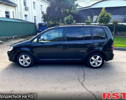 Черный Фольксваген Туран, объемом двигателя 1.6 л и пробегом 224 тыс. км за 8550 $, фото 2 на Automoto.ua