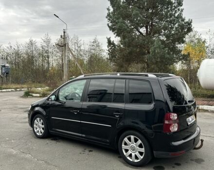 Чорний Фольксваген Туран, об'ємом двигуна 0 л та пробігом 321 тис. км за 3884 $, фото 1 на Automoto.ua