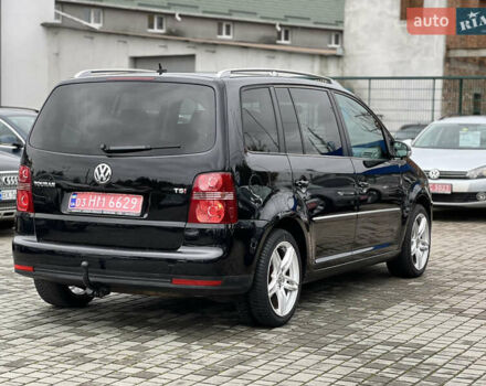 Черный Фольксваген Туран, объемом двигателя 1.4 л и пробегом 195 тыс. км за 7600 $, фото 6 на Automoto.ua