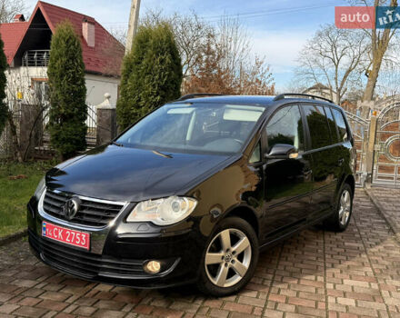Чорний Фольксваген Туран, об'ємом двигуна 1.4 л та пробігом 148 тис. км за 5999 $, фото 2 на Automoto.ua