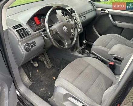 Черный Фольксваген Туран, объемом двигателя 1.4 л и пробегом 194 тыс. км за 6555 $, фото 227 на Automoto.ua