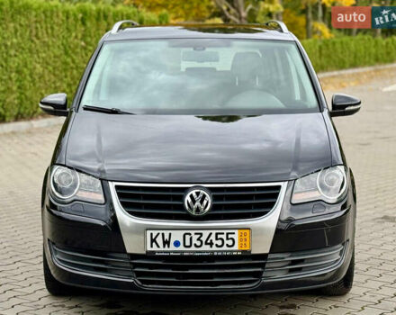 Черный Фольксваген Туран, объемом двигателя 1.4 л и пробегом 190 тыс. км за 7200 $, фото 4 на Automoto.ua