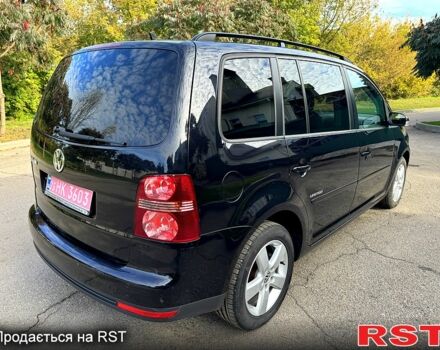 Черный Фольксваген Туран, объемом двигателя 1.6 л и пробегом 224 тыс. км за 8550 $, фото 4 на Automoto.ua