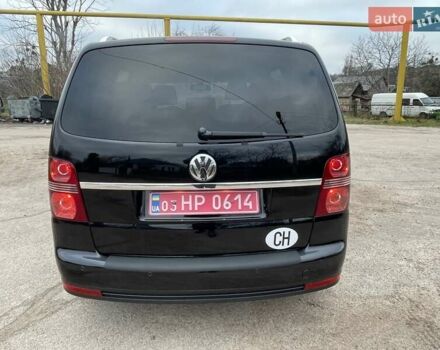 Черный Фольксваген Туран, объемом двигателя 1.4 л и пробегом 194 тыс. км за 6555 $, фото 25 на Automoto.ua