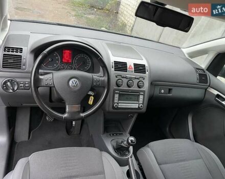 Черный Фольксваген Туран, объемом двигателя 1.4 л и пробегом 194 тыс. км за 6555 $, фото 46 на Automoto.ua