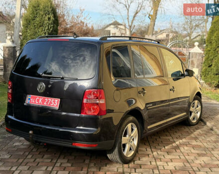 Чорний Фольксваген Туран, об'ємом двигуна 1.4 л та пробігом 148 тис. км за 5999 $, фото 26 на Automoto.ua