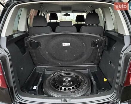 Черный Фольксваген Туран, объемом двигателя 1.4 л и пробегом 194 тыс. км за 6555 $, фото 200 на Automoto.ua