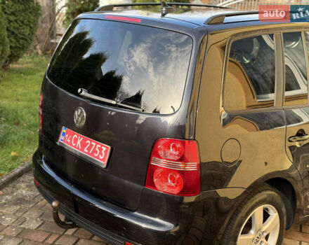 Чорний Фольксваген Туран, об'ємом двигуна 1.4 л та пробігом 148 тис. км за 5999 $, фото 67 на Automoto.ua