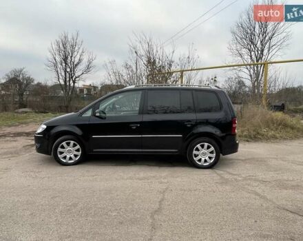 Черный Фольксваген Туран, объемом двигателя 1.4 л и пробегом 194 тыс. км за 6555 $, фото 12 на Automoto.ua