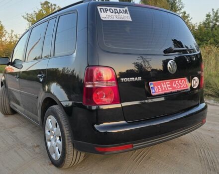 Черный Фольксваген Туран, объемом двигателя 1.4 л и пробегом 200 тыс. км за 6900 $, фото 4 на Automoto.ua
