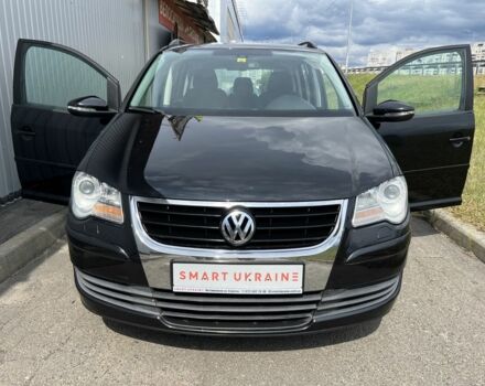 Черный Фольксваген Туран, объемом двигателя 1.4 л и пробегом 203 тыс. км за 6550 $, фото 3 на Automoto.ua