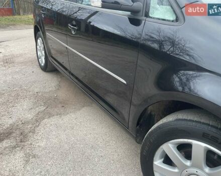 Черный Фольксваген Туран, объемом двигателя 1.4 л и пробегом 194 тыс. км за 6555 $, фото 85 на Automoto.ua