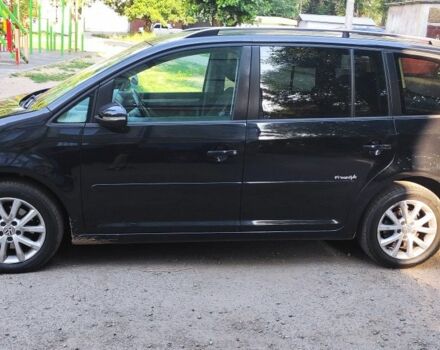 Черный Фольксваген Туран, объемом двигателя 1.9 л и пробегом 275 тыс. км за 8000 $, фото 2 на Automoto.ua