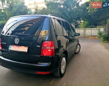Черный Фольксваген Туран, объемом двигателя 1.4 л и пробегом 193 тыс. км за 6600 $, фото 2 на Automoto.ua