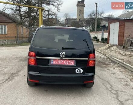 Черный Фольксваген Туран, объемом двигателя 1.4 л и пробегом 194 тыс. км за 6555 $, фото 186 на Automoto.ua