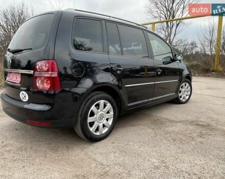 Черный Фольксваген Туран, объемом двигателя 1.4 л и пробегом 194 тыс. км за 6555 $, фото 96 на Automoto.ua