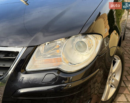 Чорний Фольксваген Туран, об'ємом двигуна 1.4 л та пробігом 148 тис. км за 5999 $, фото 69 на Automoto.ua