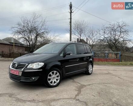 Черный Фольксваген Туран, объемом двигателя 1.4 л и пробегом 194 тыс. км за 6555 $, фото 30 на Automoto.ua
