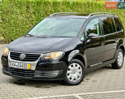 Черный Фольксваген Туран, объемом двигателя 1.4 л и пробегом 190 тыс. км за 7200 $, фото 1 на Automoto.ua