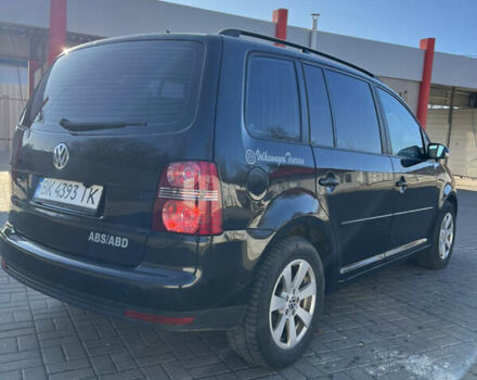 Черный Фольксваген Туран, объемом двигателя 1.9 л и пробегом 353 тыс. км за 6699 $, фото 11 на Automoto.ua