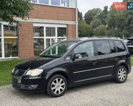 Черный Фольксваген Туран, объемом двигателя 1.4 л и пробегом 194 тыс. км за 6555 $, фото 224 на Automoto.ua