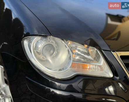 Чорний Фольксваген Туран, об'ємом двигуна 1.4 л та пробігом 148 тис. км за 5999 $, фото 70 на Automoto.ua