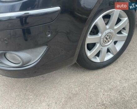Черный Фольксваген Туран, объемом двигателя 1.4 л и пробегом 194 тыс. км за 6555 $, фото 19 на Automoto.ua