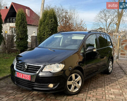 Чорний Фольксваген Туран, об'ємом двигуна 1.4 л та пробігом 148 тис. км за 5999 $, фото 1 на Automoto.ua